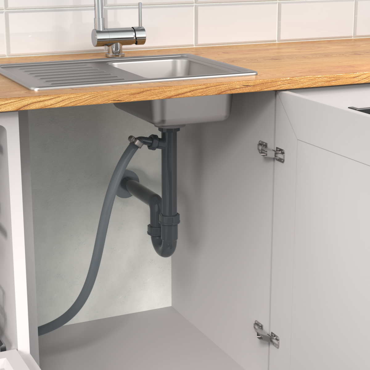 Graues Spülbecken mit Armatur und sichtbar montiertem Siphon unter der Arbeitsplatte