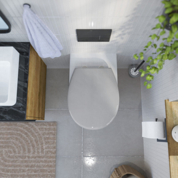 Wandhängende Toilette mit WC-Sitz in grau in einem Badezimmer