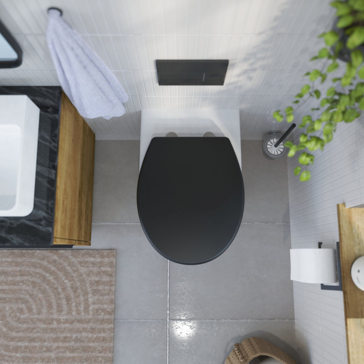 Wandhängende Toilette mit schwarzem WC-Sitz in modernem Badezimmer von oben.
