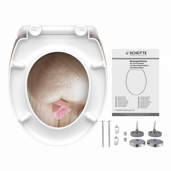 Weißer WC-Sitz mit Motiv aus Steinherz und rosa Blume, inklusive Befestigungsteilen und Anleitung.