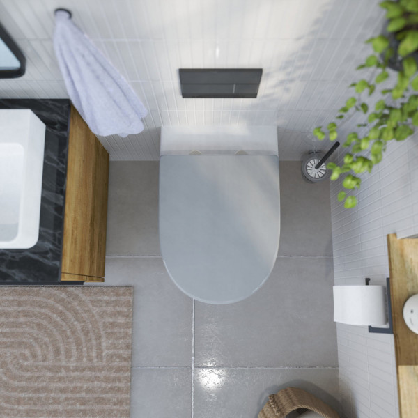 Wandhängendes WC mit grauem WC-Sitz in D-Form in modernem Badezimmer