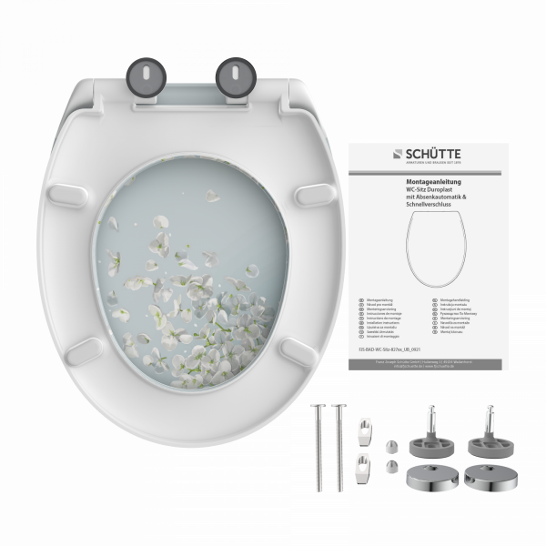 WC-Sitz mit Blumenmuster, Montageset und Anleitung von Schütte.