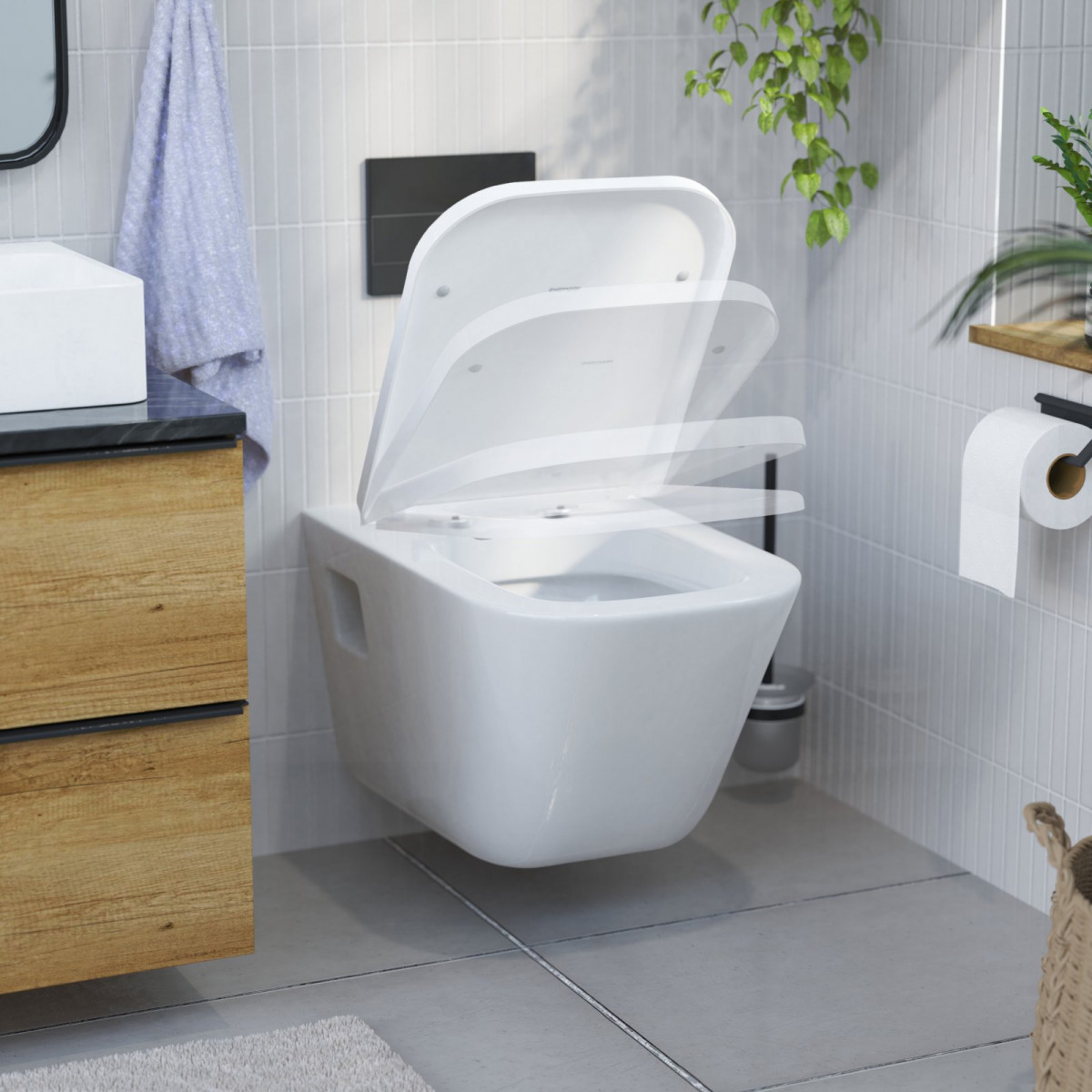 WandhÃĊngendes WC mit WC-Sitz in D-Form und Absenkautomatik in modernem Badezimmer