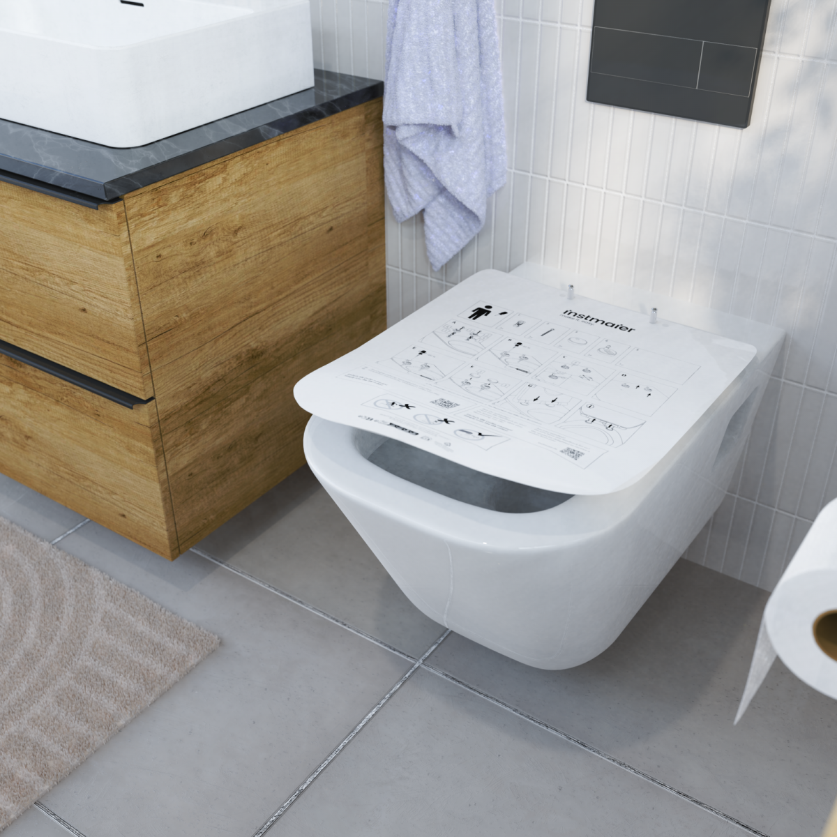 WandhÃĊngende weiÃe Toilette mit aufgelegter Montageanleitung in einem modernen Bad.