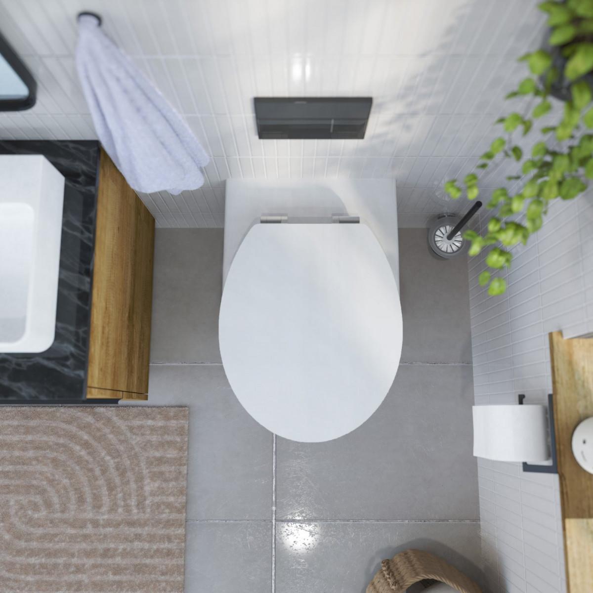 Weiße Wandtoilette mit geschlossenem weißen Deckel in modernem Badezimmer