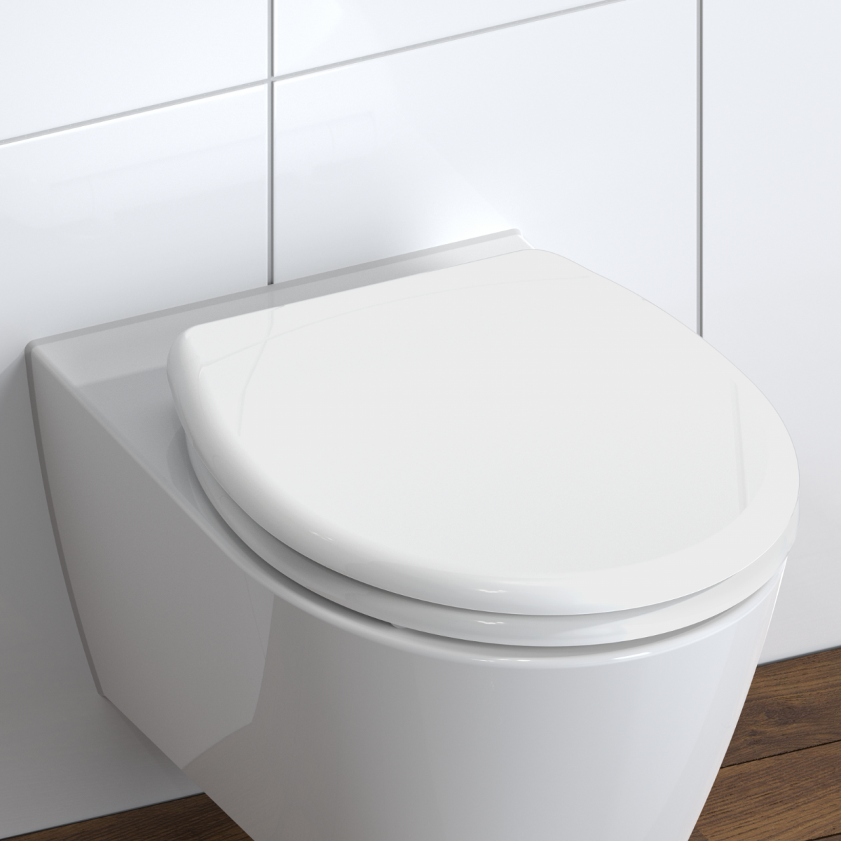 Wandhängendes weißes WC mit geschlossener ovaler WC-Sitzbrille vor Fliesenwand.