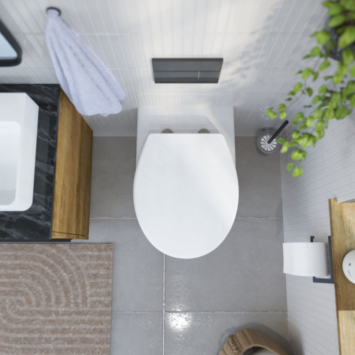 Wandhängendes WC mit geschlossenem Deckel, Ansicht von oben, umgeben von Badaccessoires.
